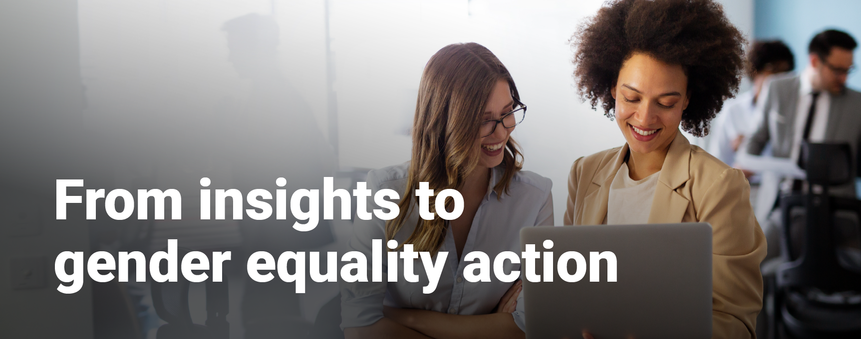 A picture of two women in the workplace collaborating on work. The text From insights to gender equality action is written on the image