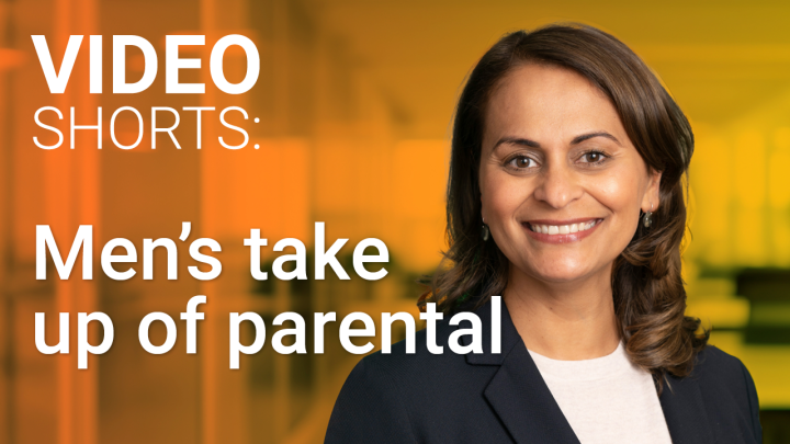 A smiling head shot of TelstraSuper's chief people officer krithika hansen, with brown shoulder-length hair and a dark suit jacket, on the left of screen in white text (on an brown background) video shorts: men's take up of parental leave