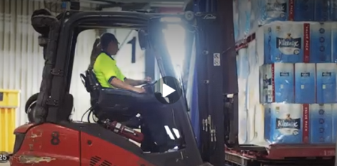 Woman driving forklift at Kimberly Clark